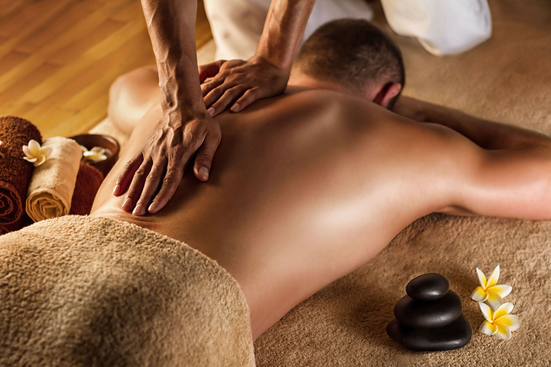 Licensed therapist performing an authentic Thai massage